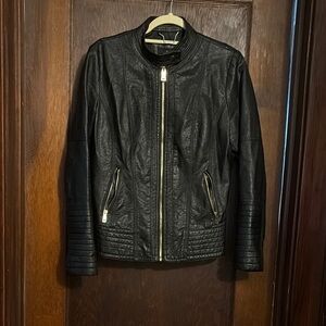 Elegant Black Leather Jacket with Quilted Details